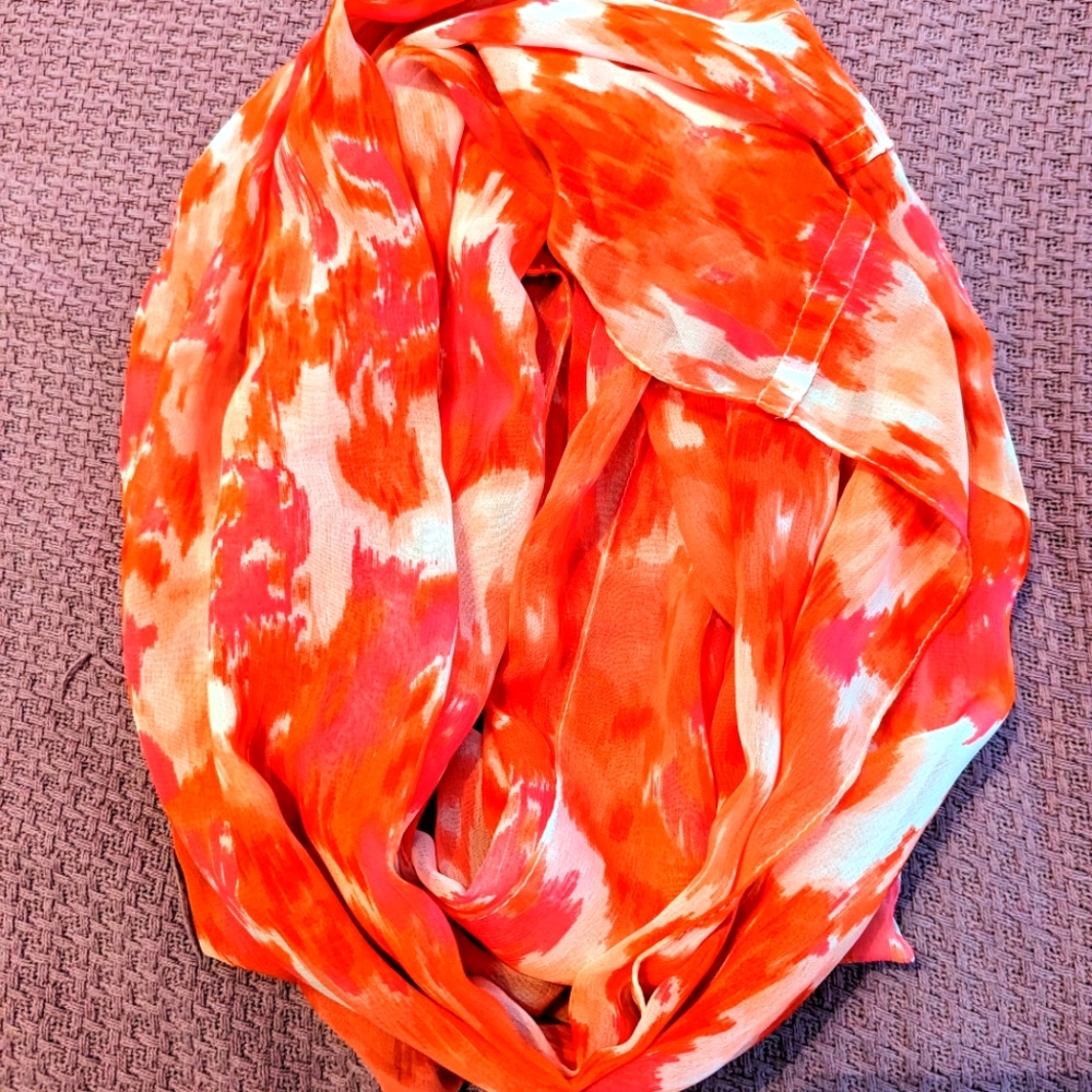 Charming Charlie coral colored scarf floral design
